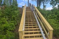 Looking Up a Lake Installation of 2 Lifts
